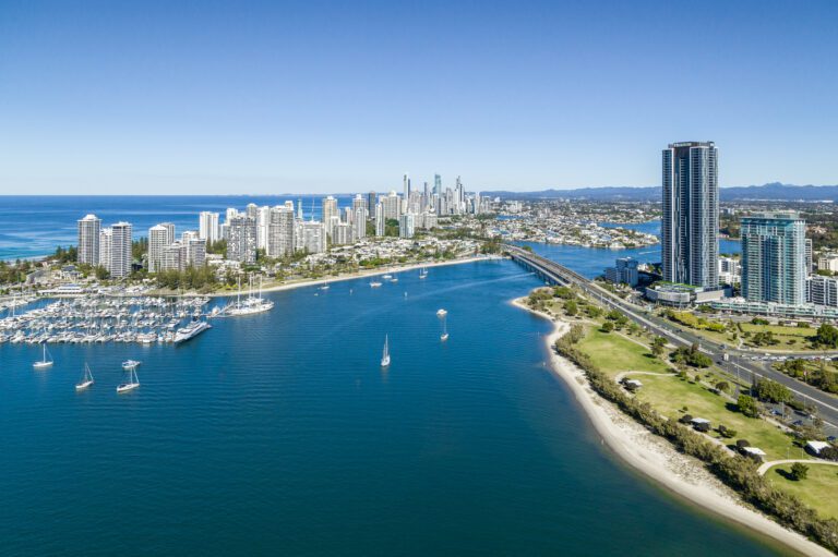 Aerial view of Gold Coast Broadwater with blue sky and blue water