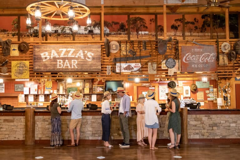 People lined-up at rustic Outback Spectacular bar